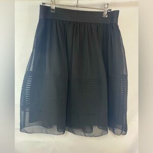 Ann Taylor black skirt, this is lined and so feminine! Womens size 8.